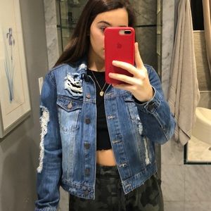 Distressed jean jacket